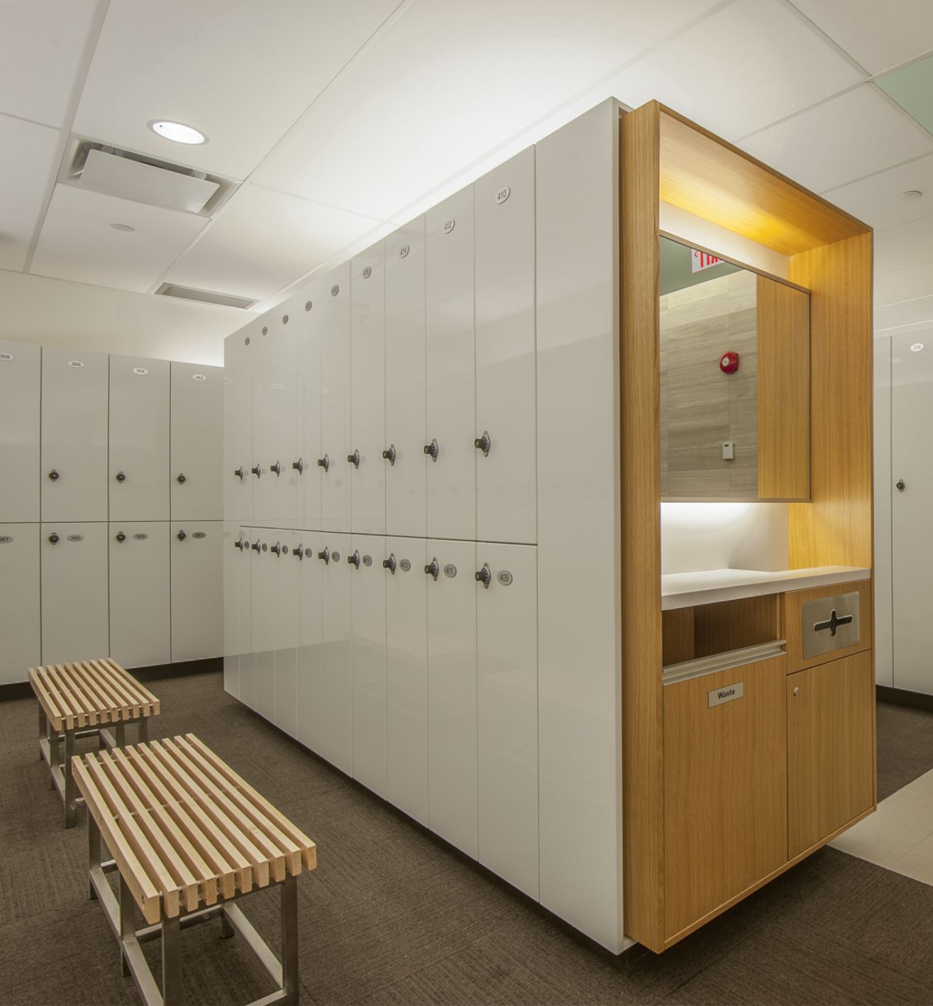 Communal locker room with stacked lockers