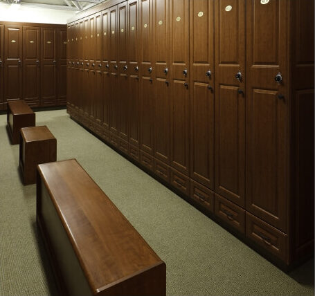 Tall wood finish storage lockers in communal space
